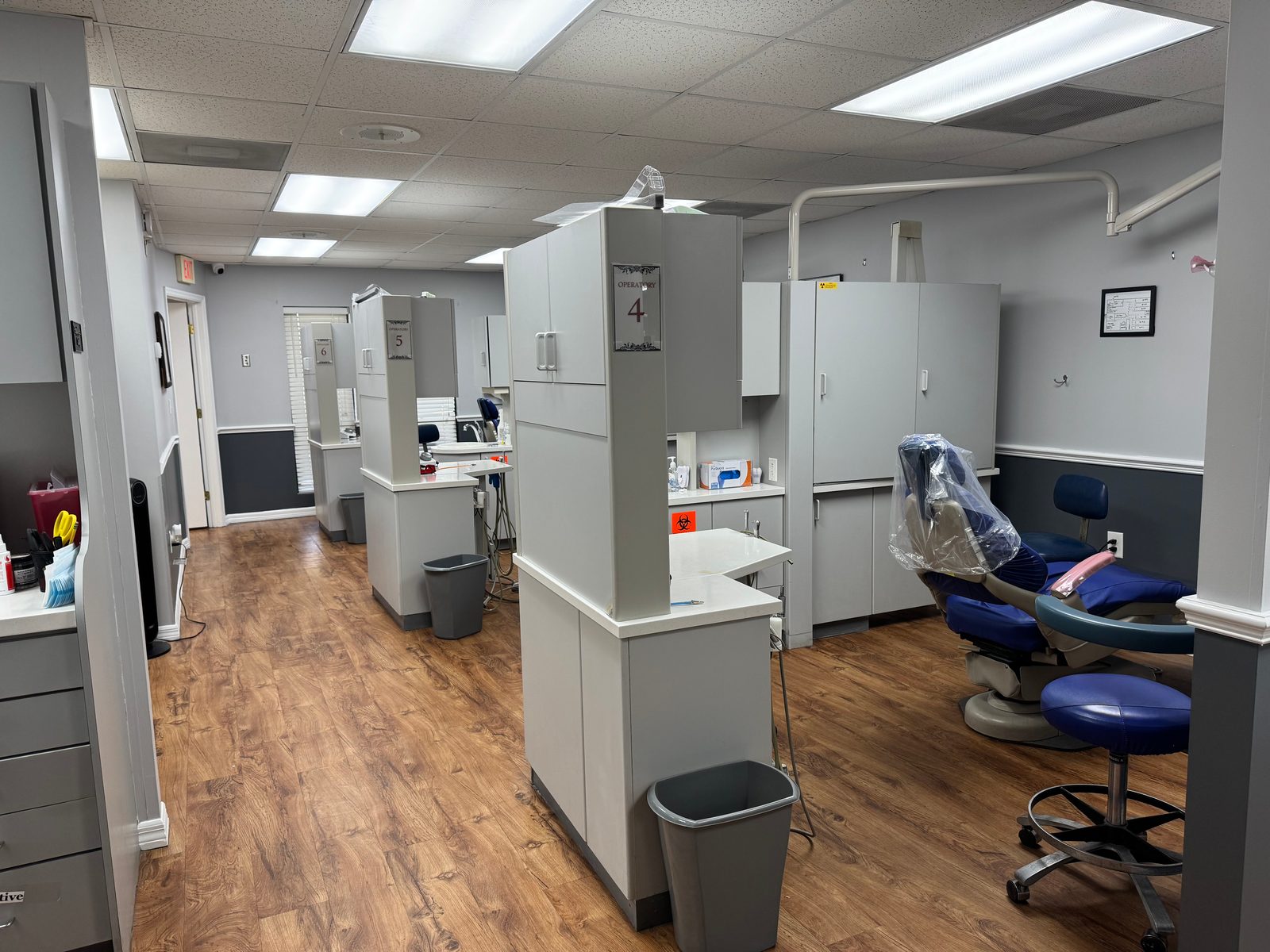 Open treatment area at Dental Day in Brandon, FL, with numbered dental operatories